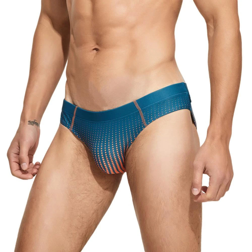 The new Gradient Color Swim Brief by Seobean.  Arrive in comfort and style with a pop of color to accent it all!  The perfect low rise swim brief for everyone.